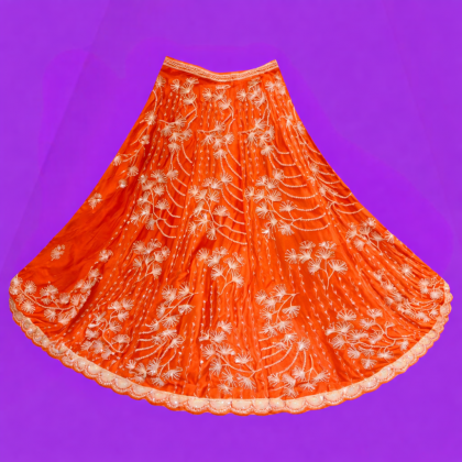 Vibrant orange lehenga with intricate embroidery